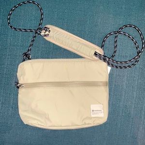 Lululemon Patch Logo Crossbody in khaki - NWT.